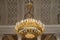 The interior of the white-Columned hall in the Yusupov Palace on the embankment of the Moika river, ceiling decor and chandelier.