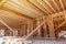 Interior with wood framing beam of new house under construction beam wood