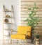 Interior with yellow armchair and ladder shelf in modern living room with wooden panelling, home design 3d rendering