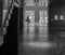 Interiors of the Whitworth Art Gallery in Manchester with a woman facing towards Whitworth Park