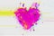 Interlaced pink heart icon with digital glitch distortion effect