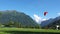 INTERLAKEN, SWITZERLAND: Paragliders in front of the Alps in Interlaken, Switzerland. Interlaken is a resort town in the