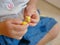 Interlocking plastic bricks toy in baby`s hands