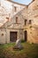 Internal courtyard with stone millstone at Villa Santa Maria in the province of Chieti Italy