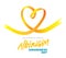 International Albinism Awareness Day. Yellow ribbon folded in the shape of a heart as a symbol of a rare genetic disease