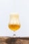 International beer day with pouring beer into glass on white background.