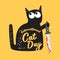 International cat day funky banner with black cat holding bloody knife isolated on orange background. World cat day