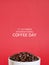 International Coffee Day illustration background. Coffee beans on a white cup on red background.