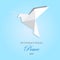 International Day of Peace. paper cut dove of peace flies against the blue sky. Realistic vector