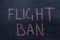 International flights and Novel coronavirus. flight ban text on a chalkboard