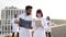 International group of health care workers at city rooftop.