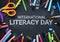 International Literacy Day. School Stationary Top View on Blackboard