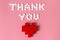 International`s nurses day, week concept, Text Thank you by tablets and red heart on pink background.