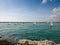 International sailors in wind sailing boats entering Vilamoura Marina, Portugal