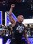 International superstar the Rock, Dwayne Johnson, holds arm in t