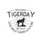 International tiger day emblem. Wild animal badge design. Vintage hand drawn typography logo of tigerday with sun bursts