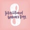 International Women s Day hand lettering against figure eight on pink background. Elegant vector illustration with