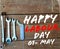 International Workers' Day Celebration on May 1st, also known as May Day or labour day , Wooden background with Tools