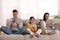 Internet addiction. Family with gadgets on sofa in living room