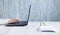 Internet router in the desk. Girl using laptop