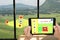 Internet of thingsagriculture concept,smart farming. Farmer hold tablet and ust the application to monitor the condition in the