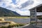 An interpretive hut with a view of Rakatu Wetlands in the South Island of New Zealand.