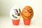 Interracial love concept. Eggs with painted face