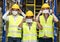 Interracial warehouse worker team putting on  face mask