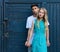 Interracial young couple in love outdoor. Stunning sensual outdoor portrait of young stylish fashion couple posing in summer. Girl