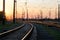 Intersecting railroad tracks and traffic lights at the station