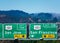 Interstate 101 highway road sign showing drivers the directions to San Jose and San Francisco in Silicon Valley. Green hills with