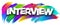 Interview paper word sign with colorful spectrum paint brush strokes over white