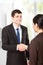 Interviewer shaking hand to future employee