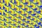 Interwoven colorful background pattern in yellow, blue and red