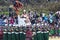 Inti raymi -festival of the sun-inca woman carried in her chair by her indigenous people in the ruins of sacsayhuaman cuzco