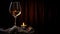 intimate wine glass dark background