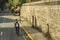 Intramuros, Manila, Philippines - Recreational Cyclists bike along Muralla street inside the walls of Intramuros