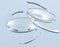 Intraocular lens IOL on grey background. Medicallc 3D illustration