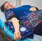 Intravenous infusion therapy on mature woman