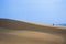 Intrepid Traveler on white sand dunes