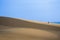 Intrepid Traveler on white sand dunes