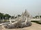 Intricate architecture of the White Temple in Chiang Rai, Thailand.