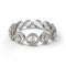 Intricate Diamond And White Gold Band With Circular Shapes