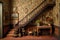 intricate dollhouse staircase and detailed wallpaper