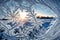 The intricate frost patterns on a window, providing a close-up view of the delicate beauty that