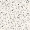 Intricate hand crafted grunge terrazzo design. Seamless vector pattern on faded paper color background. Great for