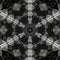 intricate hexagonal black and white with with shades of grey pattern and design