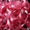 Intricate interweaving of pink ribbons