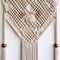 Intricate Macrame Wall Hanging with Delicate Knots and Natural Elements