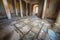 intricate mosaic floor in ancient ruins, surrounded by broken columns and debris